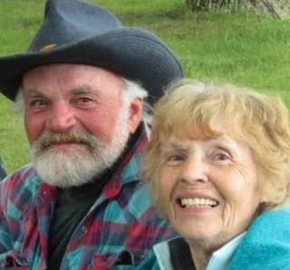 Ray and Shirley Maurer, founders of Verona Meadows, smiling together outdoors